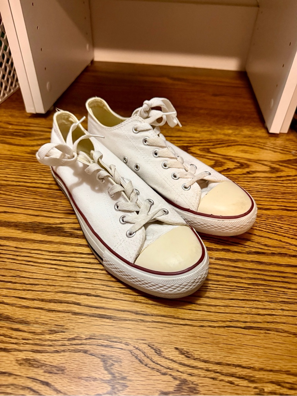 Converse white low-top sneakers